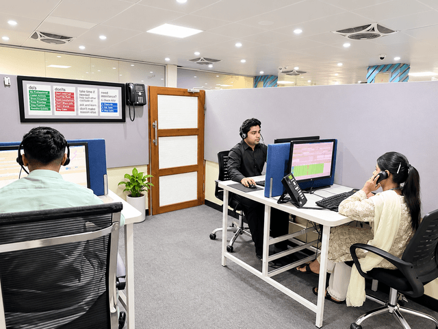 ORiON operators handling calls at their desks